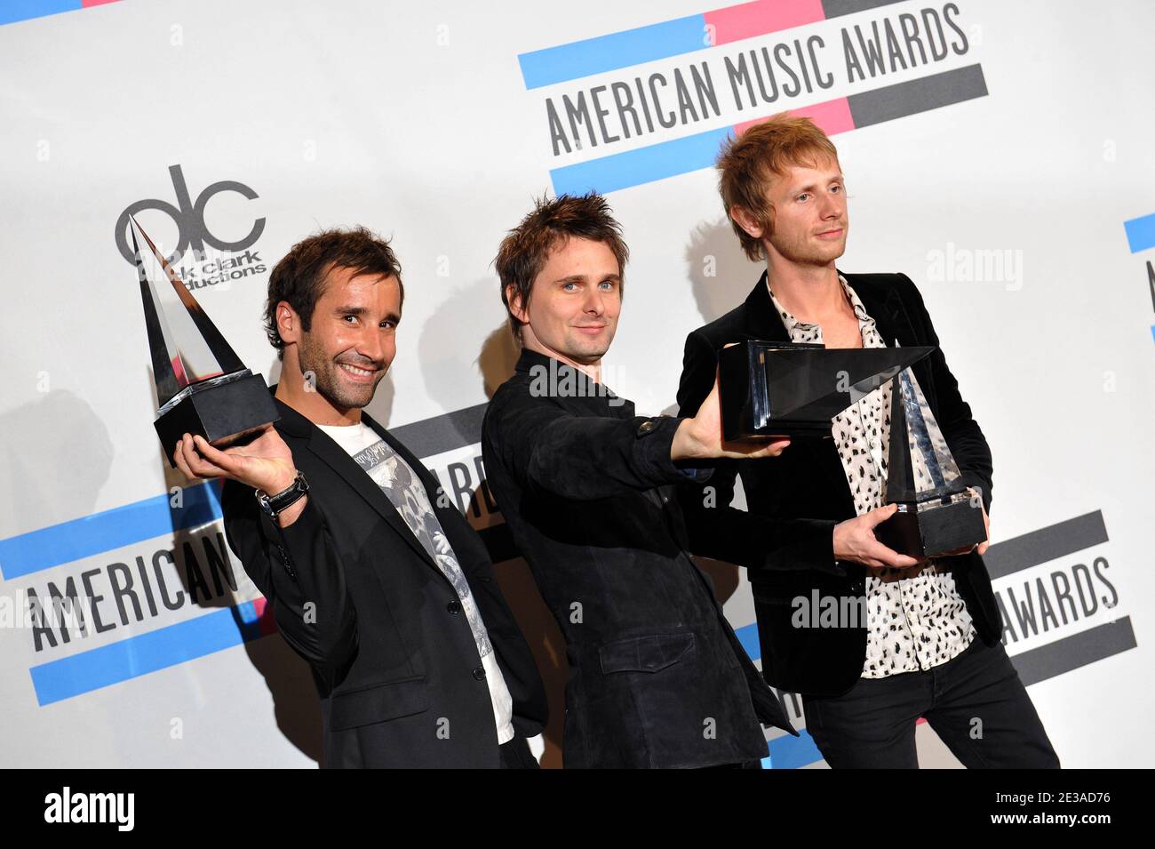 Alternative rock group Muse posing in the press room of the 2010 American Music Awards at the Nokia Theatre in Los Angeles, November 21, 2010. Photo by Lionel Hahn/ABACAPRESS.COM Stock Photo