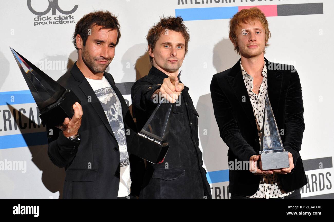 Alternative rock group Muse posing in the press room of the 2010 American Music Awards at the Nokia Theatre in Los Angeles, November 21, 2010. Photo by Lionel Hahn/ABACAPRESS.COM Stock Photo