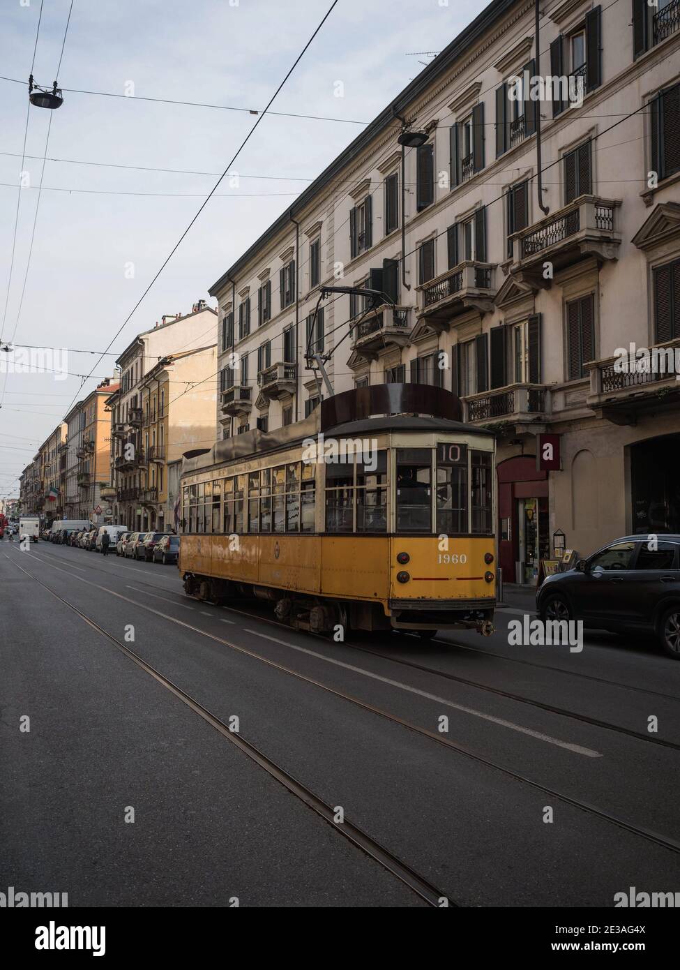 Panorama view of an old historic vintage retro yellow electric street car  tram way tranviaria in Milan Lombardy Italy Europe Stock Photo - Alamy