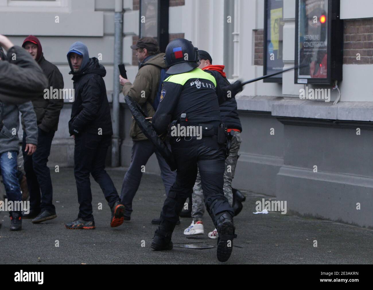 Anti-riot police officers intervened against anti-lockdown protestors during demonstration at the Museumplein amid the coronavirus pandemic on January Stock Photo