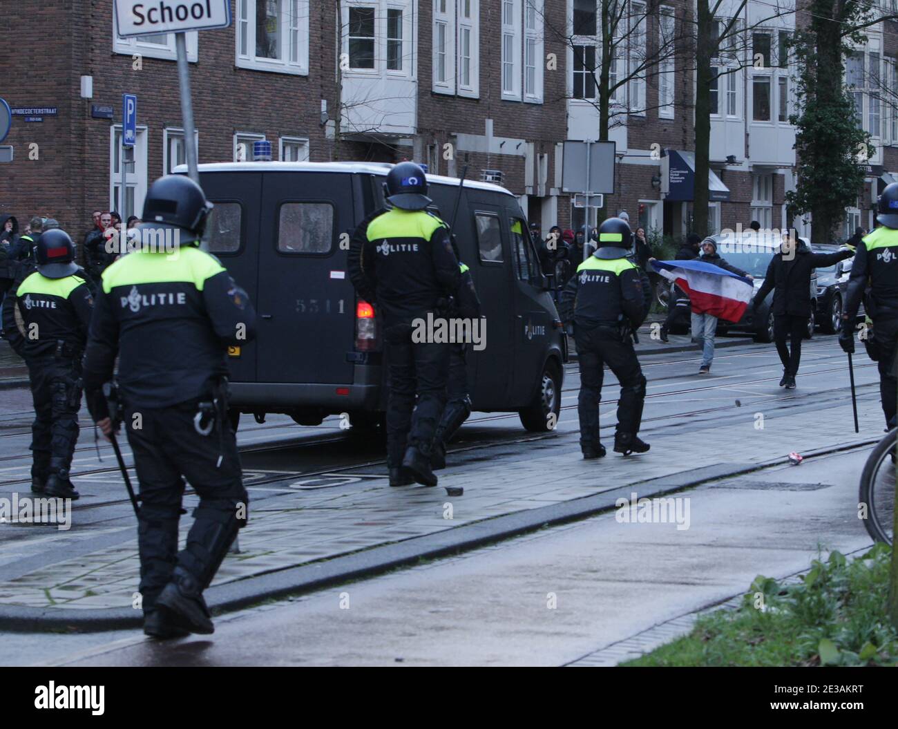 Anti-riot police officers intervened against anti-lockdown protestors during demonstration at the Museumplein amid the coronavirus pandemic on January Stock Photo