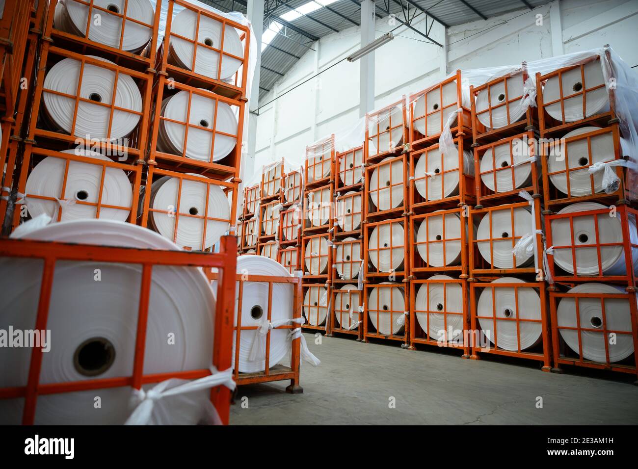 Stock of plastic film rolls to produce Shopping bags in warehouses. In