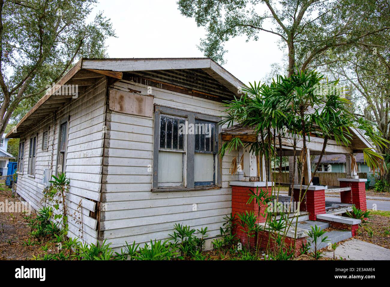 Dilapidated house in gentrified neighborhood - Seminole Heights Neighborhood, Tampa, Florida Stock Photo