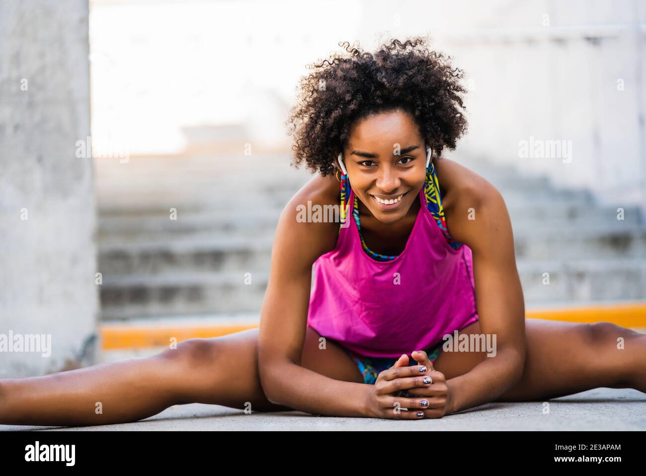 Afro Athlete Woman Stretching Legs Before Exercise Stock Photo Alamy