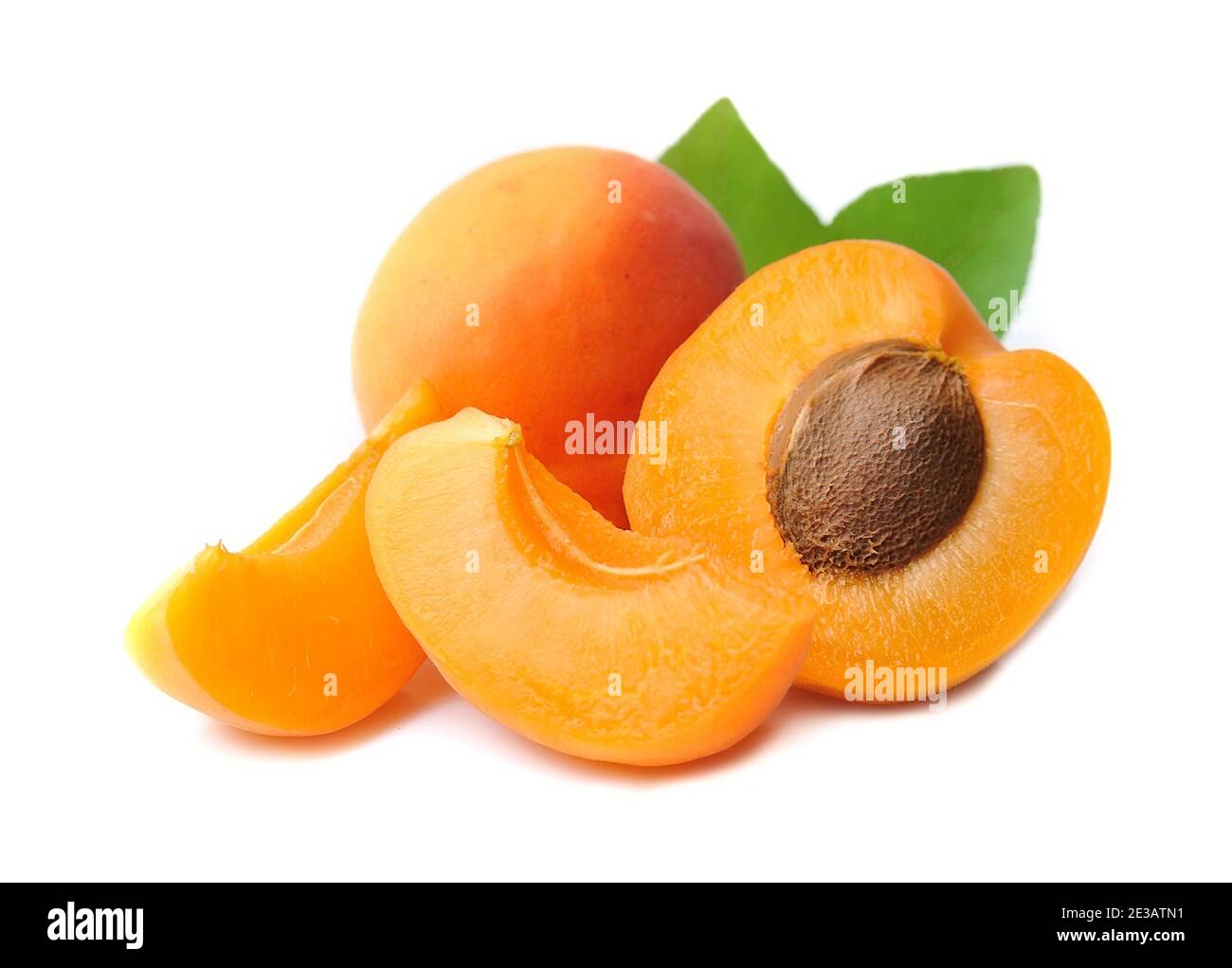 Apricots with leaves isolated on white backgrounds Stock Photo - Alamy
