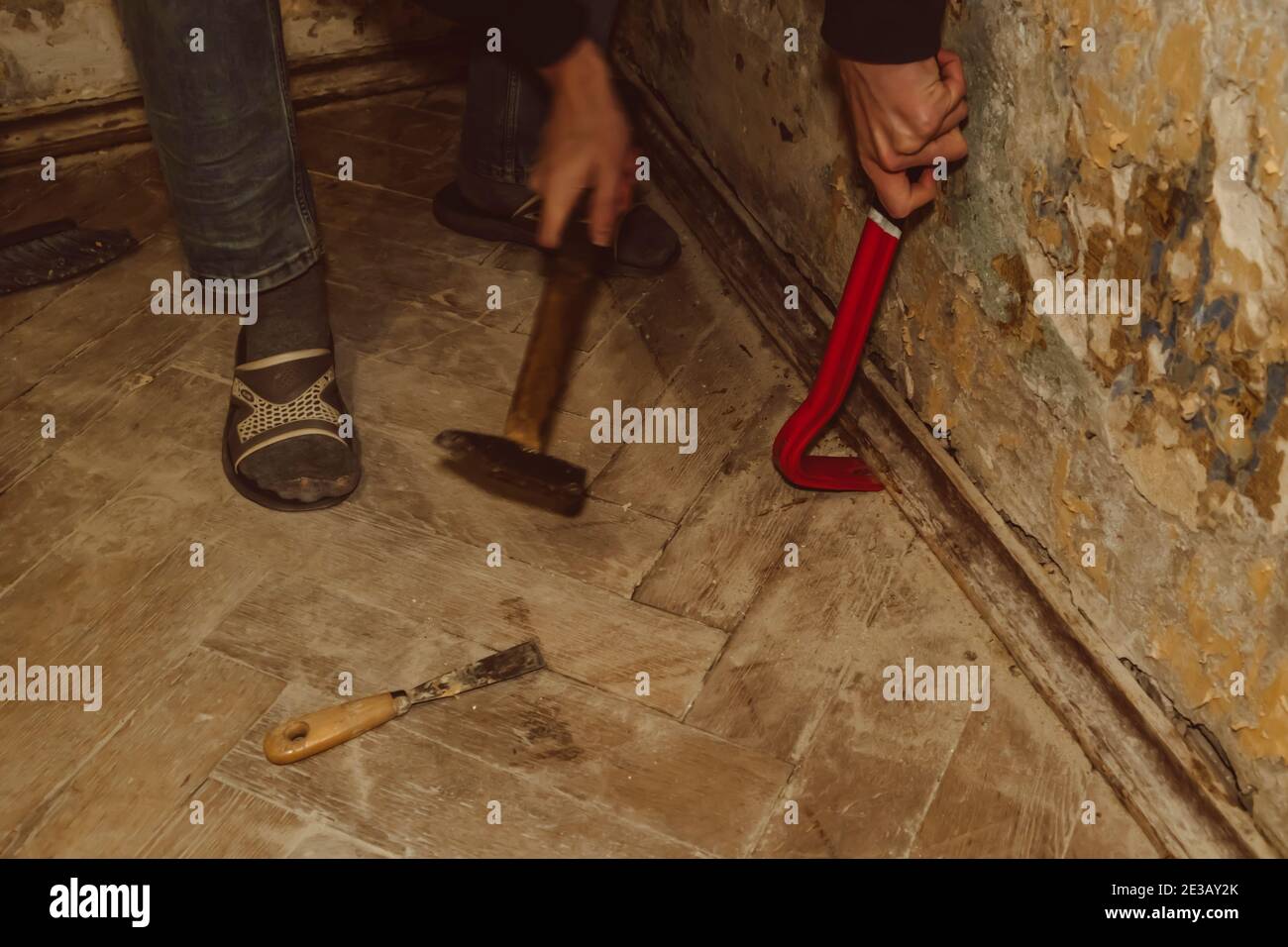 dismantling the floor parquet loft retro construction work crowbar