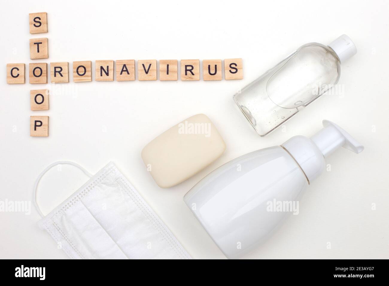 bottle of antibacterial soap and bottle antibacterial gel for hands, bar of soap, medical mask Stock Photo