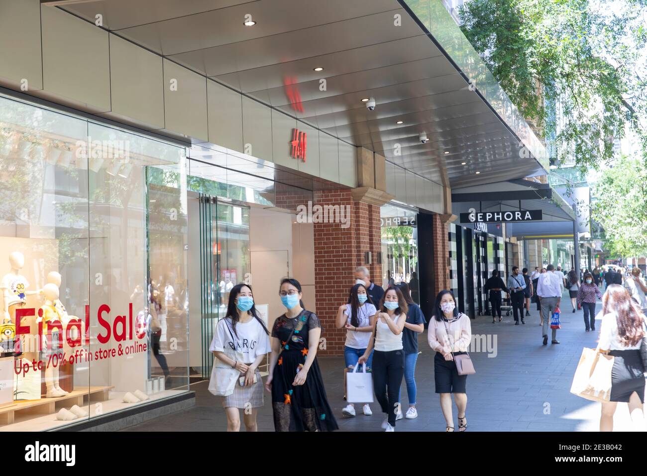 Girls women in Sydney wearing face masks during Covid 19 pandemic and