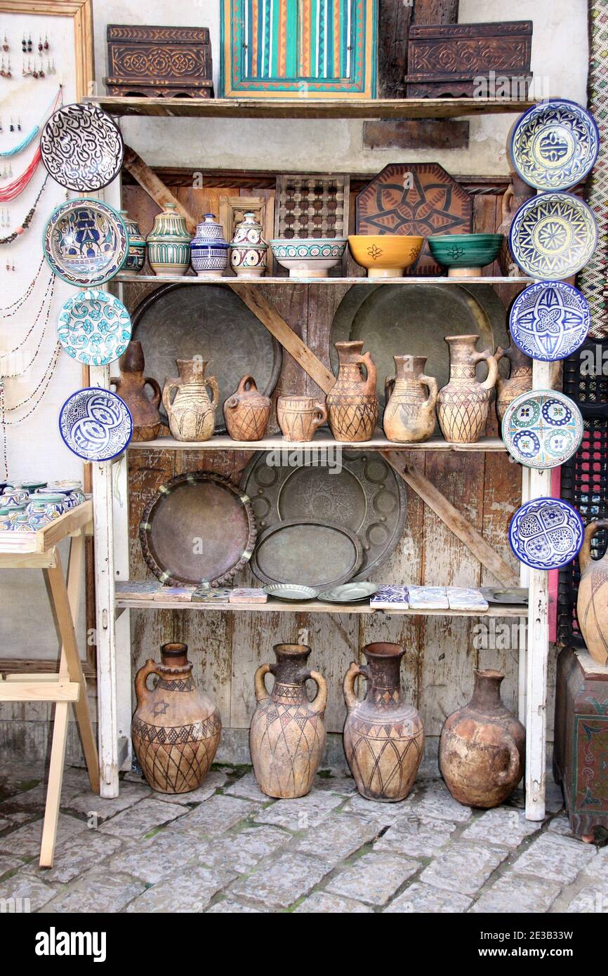 Traditional moroccan souvenirs plates, jug and pots made of clay