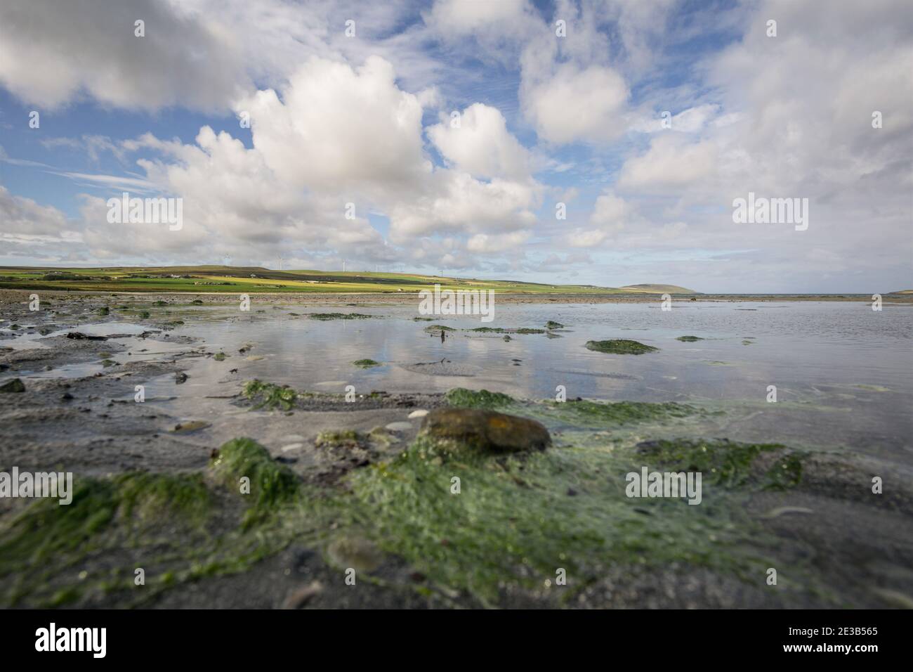 View of the Sands of Evie in Aikerness Bay at low tide. The bay is on the coast of Eynhallow Sound on the northwest coast of Mainland Orkney, Scotland Stock Photo