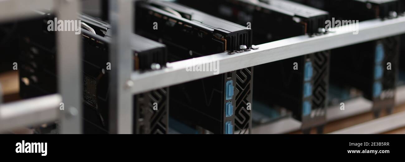 Set of riser installed at pci express slots of cryptocurrency mining farm Stock Photo