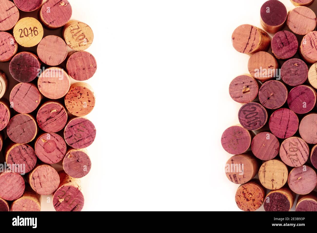 Wine corks frame, a design template for a restaurant menu or tasting invitation, overhead shot with copy space, on a white background Stock Photo