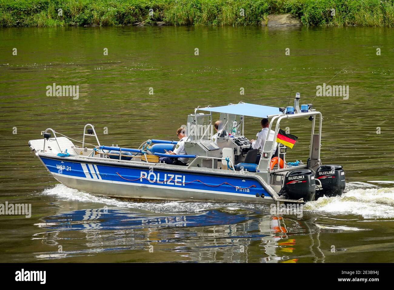A German police boat on the Elbe River controls the border between the Czech Republic and Germany Stock Photo