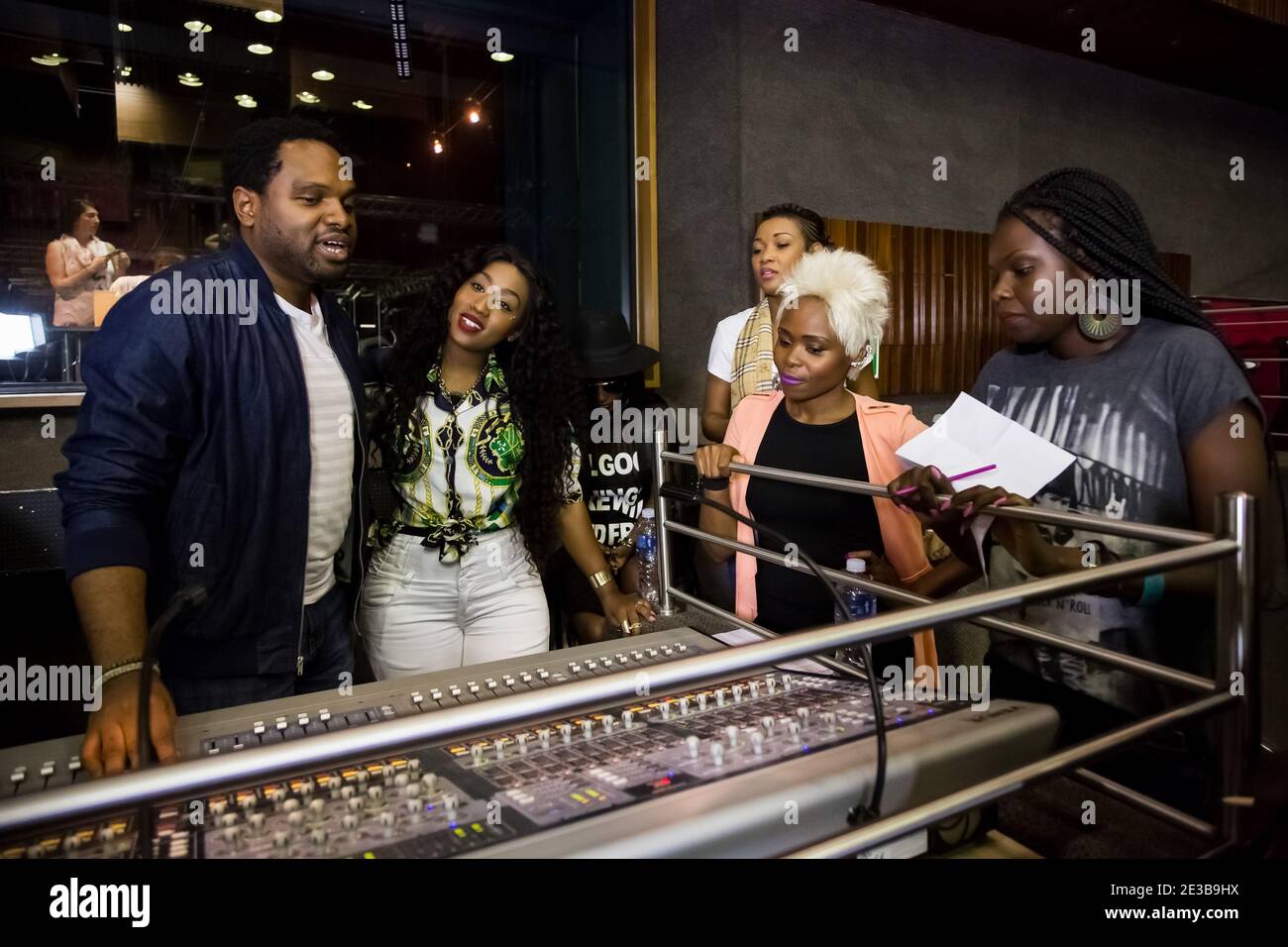 Johannesburg, South Africa - April 28, 2015: Nigerian Music producer Cobhams Asuquo working in studio with African artists Stock Photo