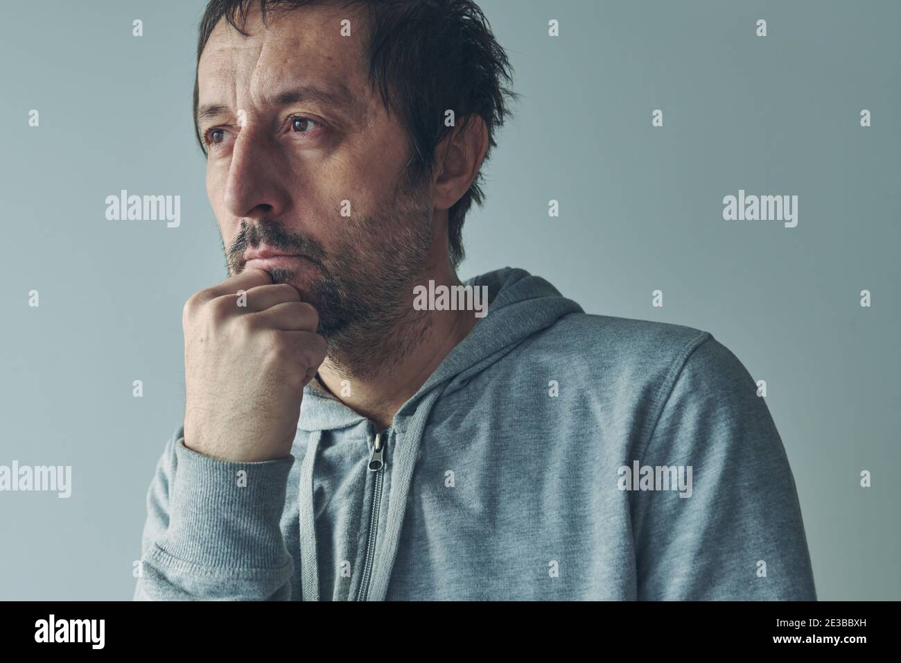 Introspection concept, man thinking an analyzing himself, portrait of thoughtful casual caucasian male person Stock Photo