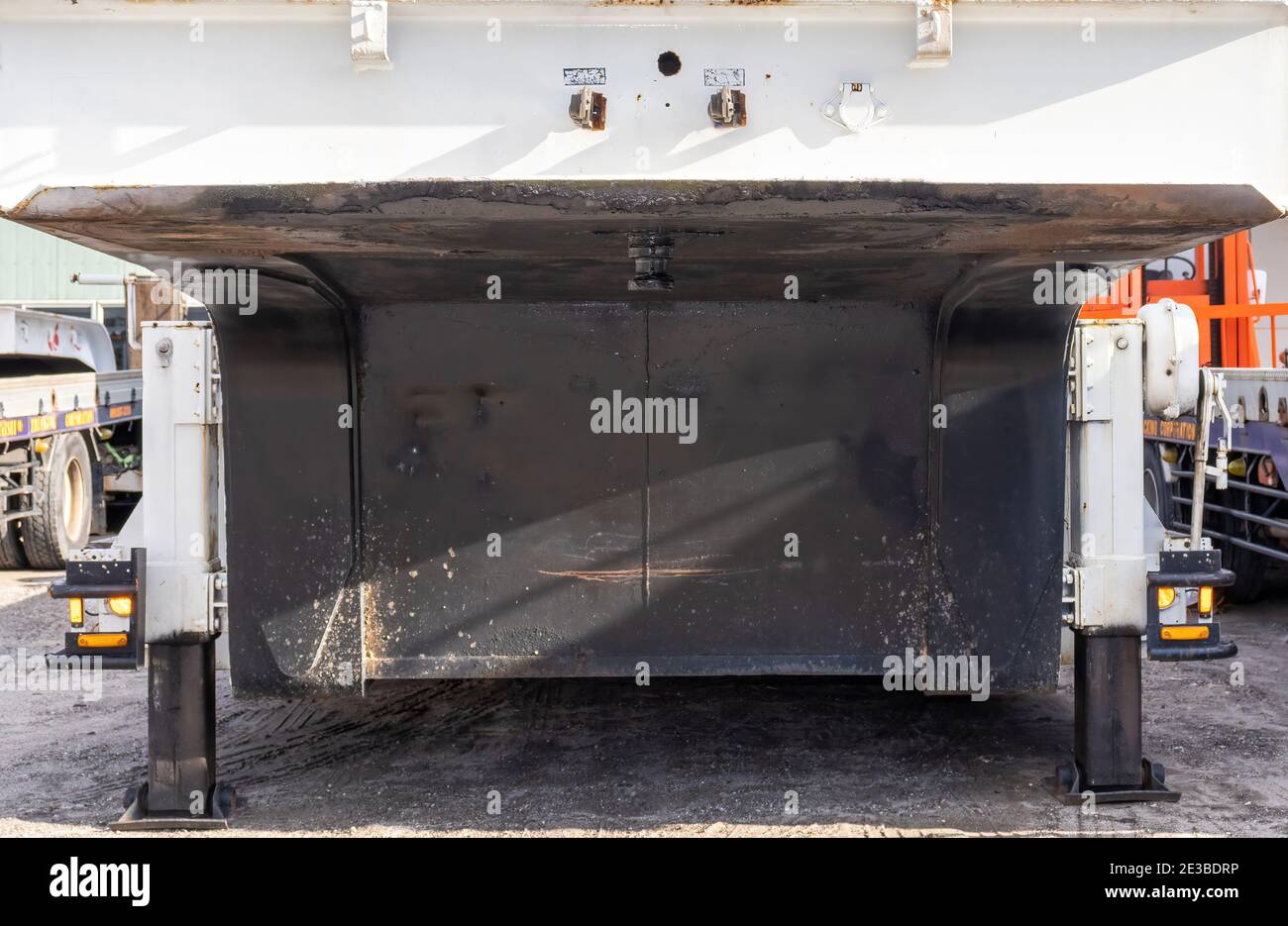 Front end of a flatbed trailer with a step deck The deck is