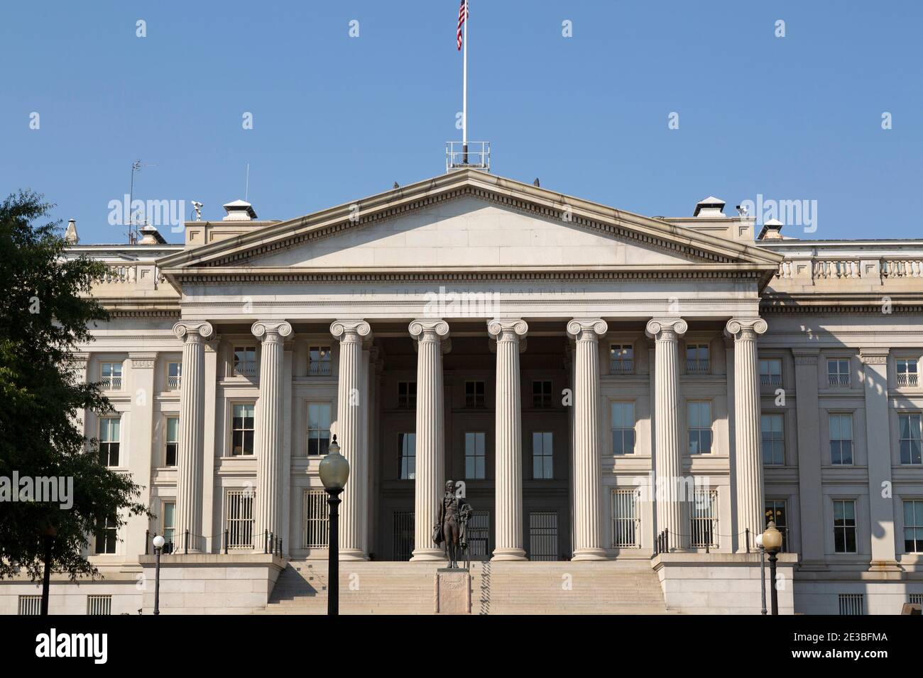 The Treasury Building in Washington DC, USA. A statue of Alexander