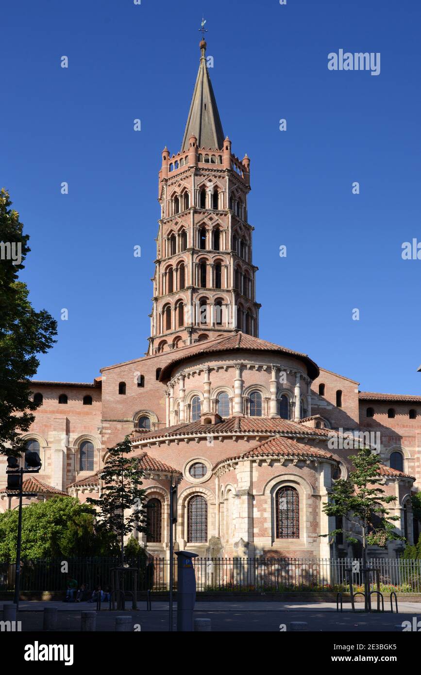 Apse & East Facade of the Romanesque Red Brick Basilica of Saint Sernin or Church & Belfry or Bell Tower Toulouse Haute-Garonne France Stock Photo