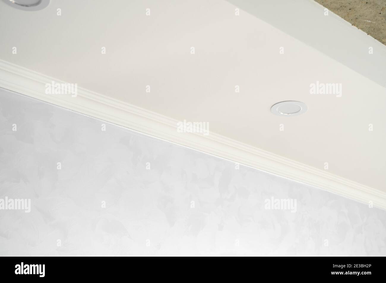 White ceiling with a white plinth in a room with gray painted walls.  Decoration of the corner between the ceiling and the wall in the room.  Ceiling Stock Photo - Alamy