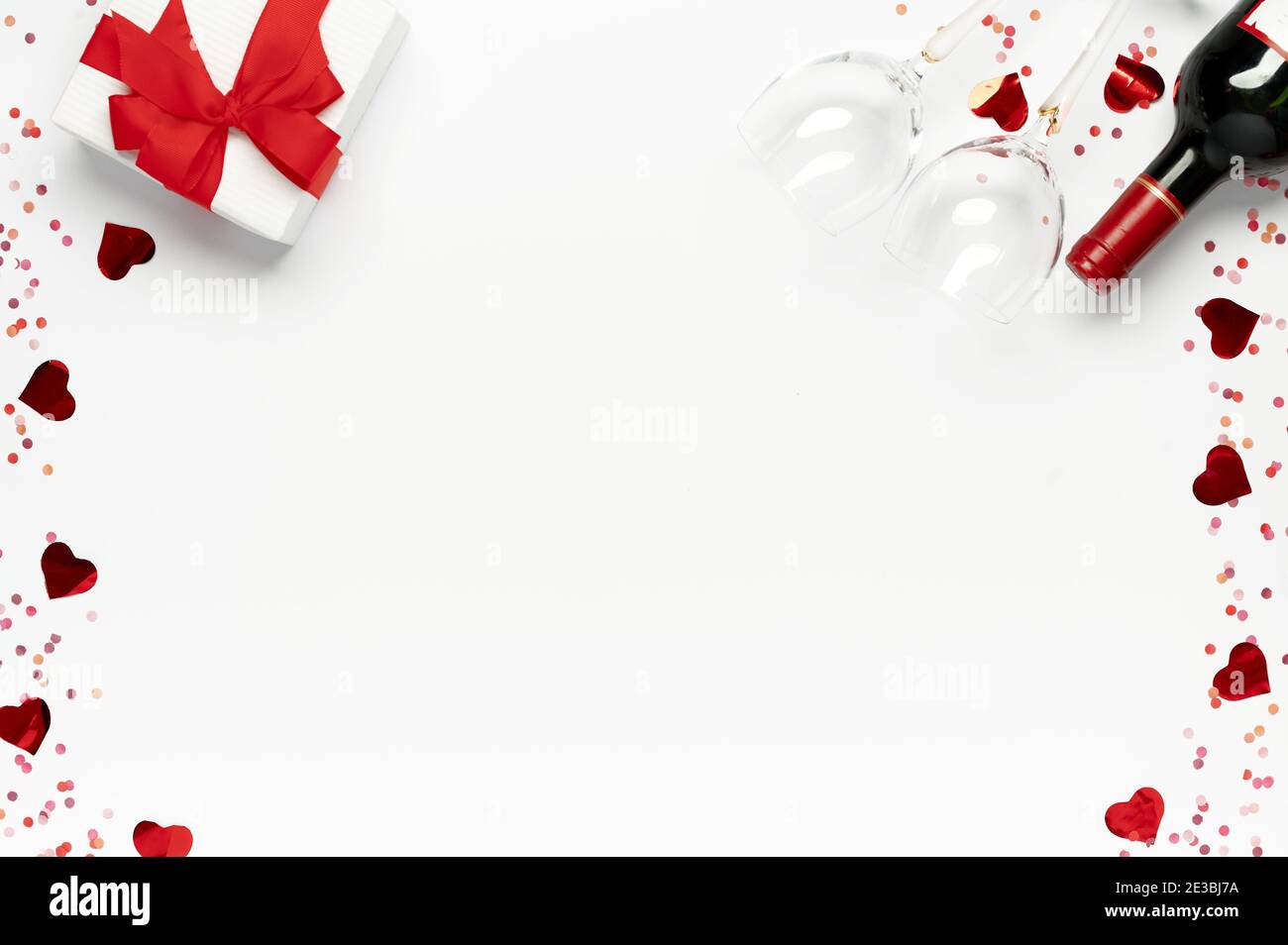 Happy valentine day. Bunch of red roses with gift box, wine bottle and ...