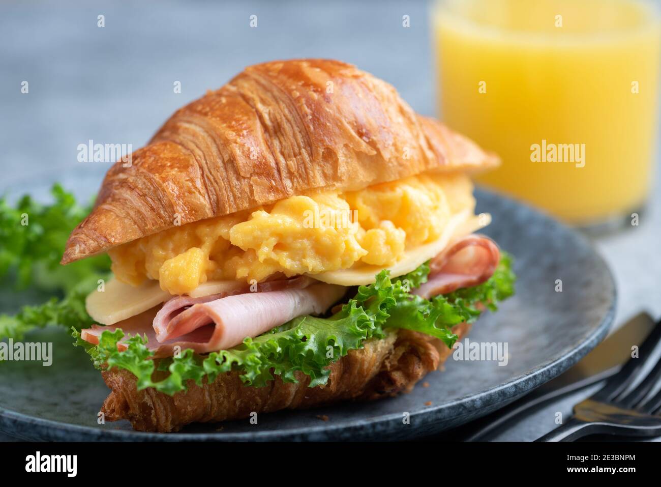 Croissant Sandwich With Ham Cheese Scrambled Eggs And Lettuce Salad Closeup View Tasty Healthy Breakfast Sandwich Stock Photo Alamy