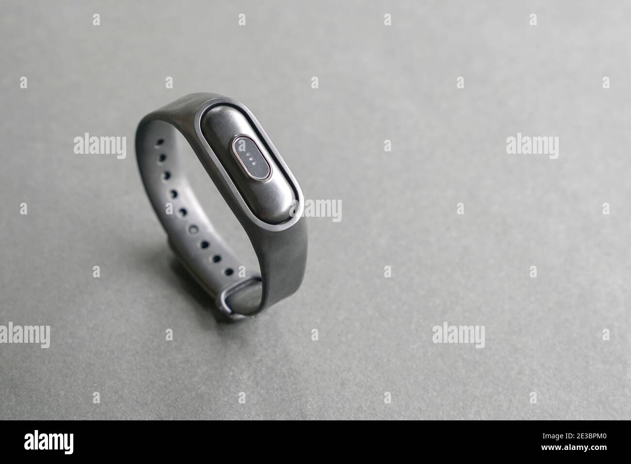 Intelligent health watch bracelet on black background. Copy space. Stock Photo