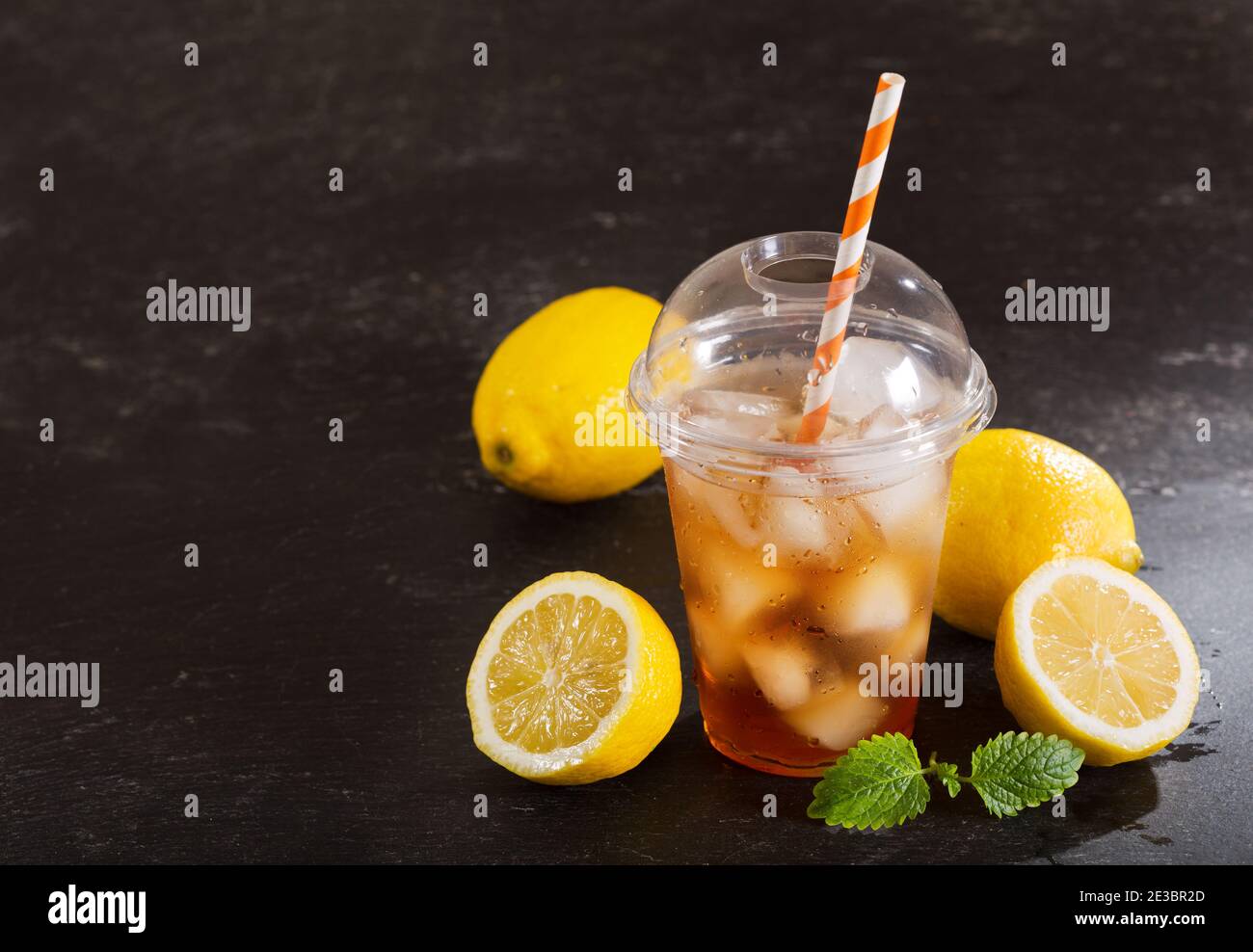 Fresh ice tea in plastic glass  Iced tea, Ice lemon tea, Plastic glass