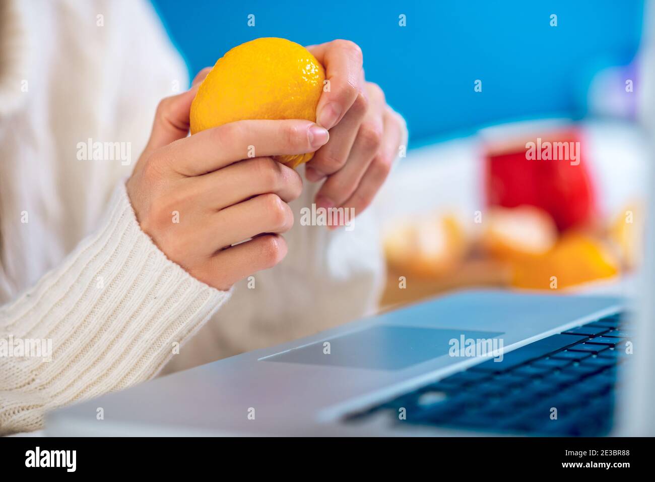 Womans hands peeling tangerine hi-res stock photography and images - Alamy