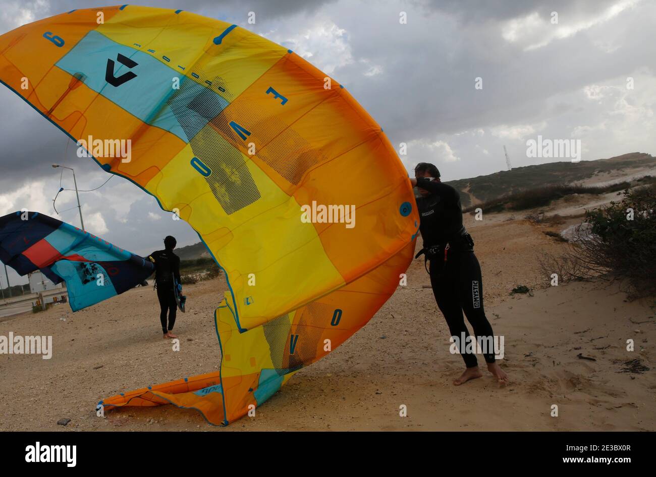 Netanya, Israel. 17th Jan, 2021. Israeli kite surfers practice on the
