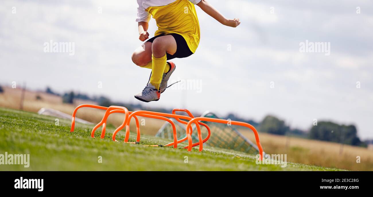 Boy running hurdles hires stock photography and images Alamy