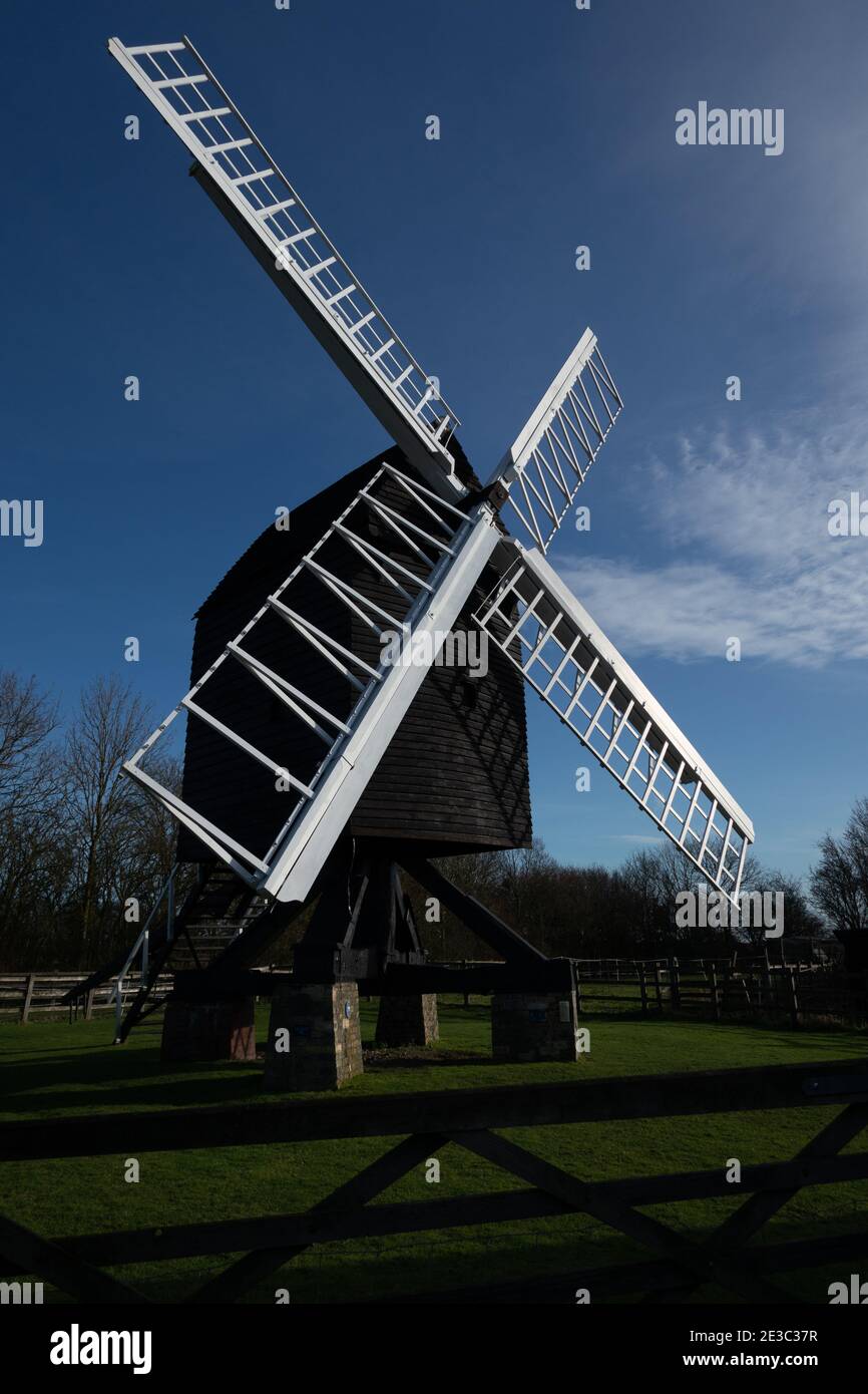 Bourn Windmill with white sails an open trestle post mill near  Caxton, Cambridge England Stock Photo
