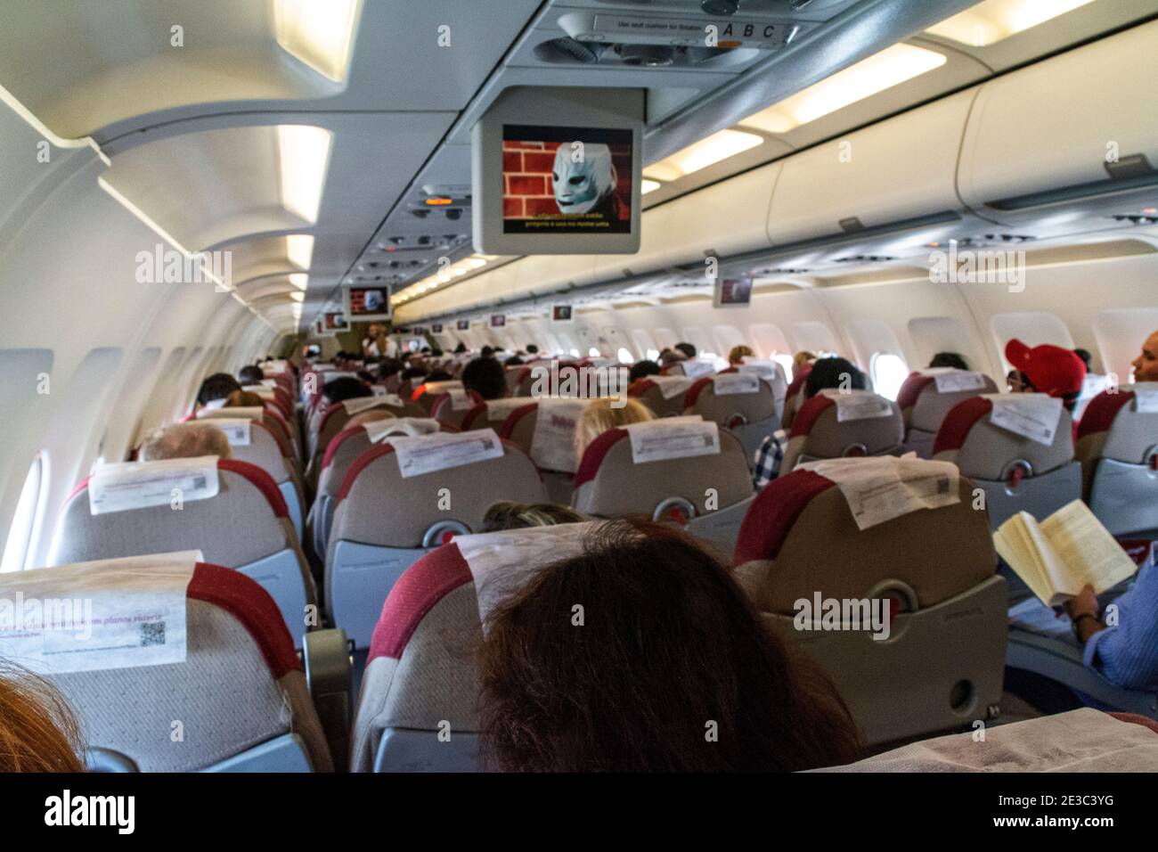 Passenger economy cabin on an Airbus 320 - TAM Linhas at Brasilia International airport in Brasilia, capital city of Brazil.   TAM is a Brazilian Nati Stock Photo