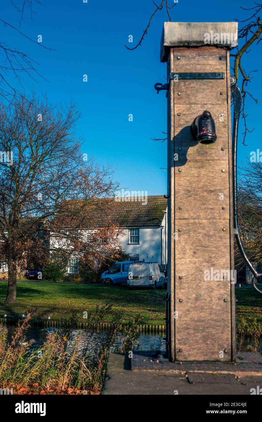 Village water pump on The Green Histon near Cambridge England Stock Photo