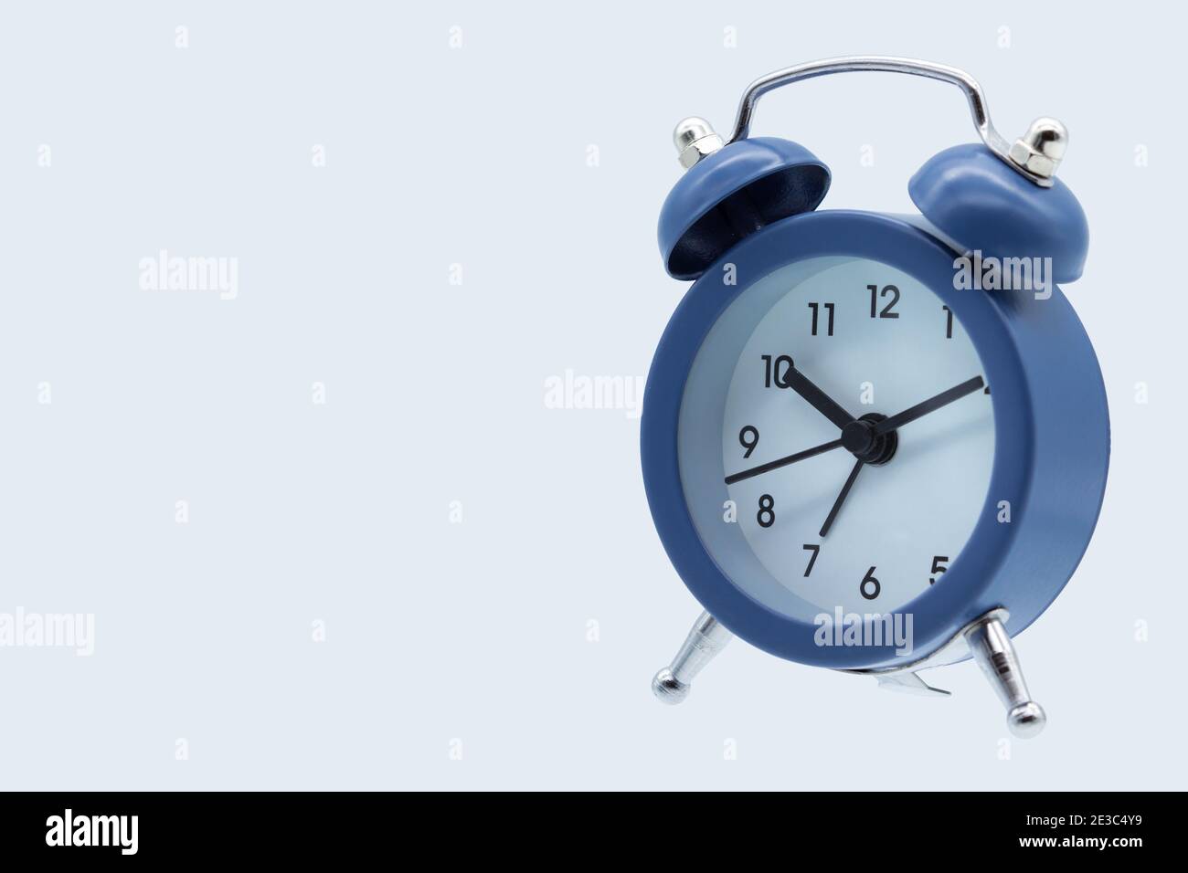 Classic alarm clock isolated on white background Stock Photo - Alamy