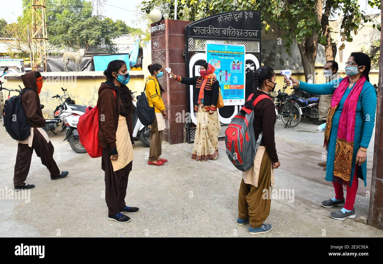 Beawar, Rajasthan, India, Jan. 18,2021: Students undergo thermal screening as they arrive to attend classes at a government school that was reopened after remaining closed for 309 days due to COVID-19 pandemic in Beawar. Credit: Sumit Saraswat/Alamy Live News Stock Photo