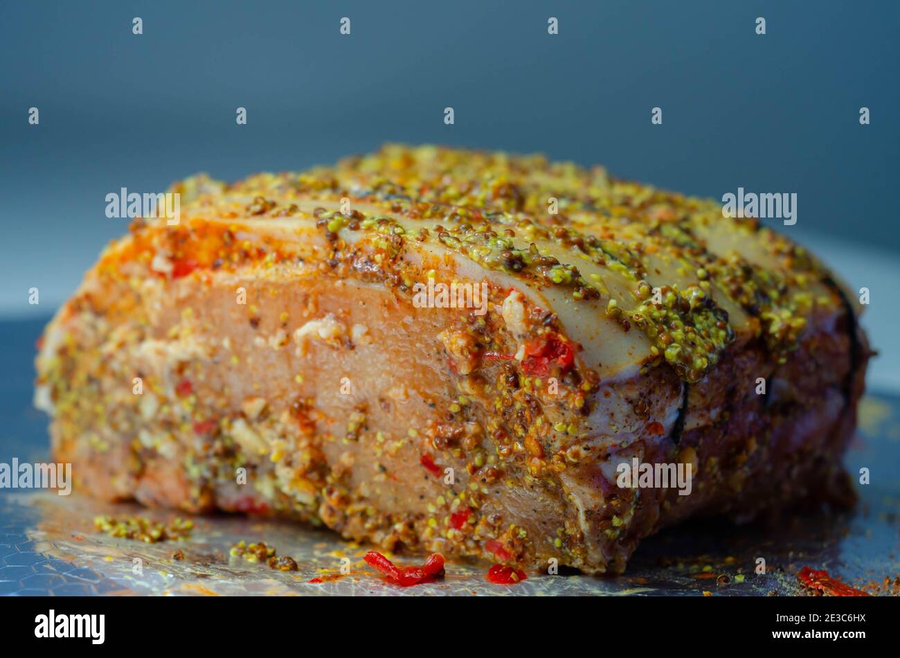 Boneless British rindon pork loin joint, prepared in marinades