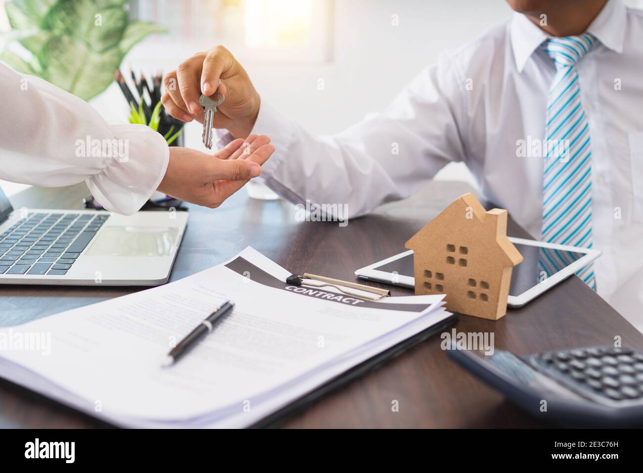 real estate, broker residential house give key to customer, buy home