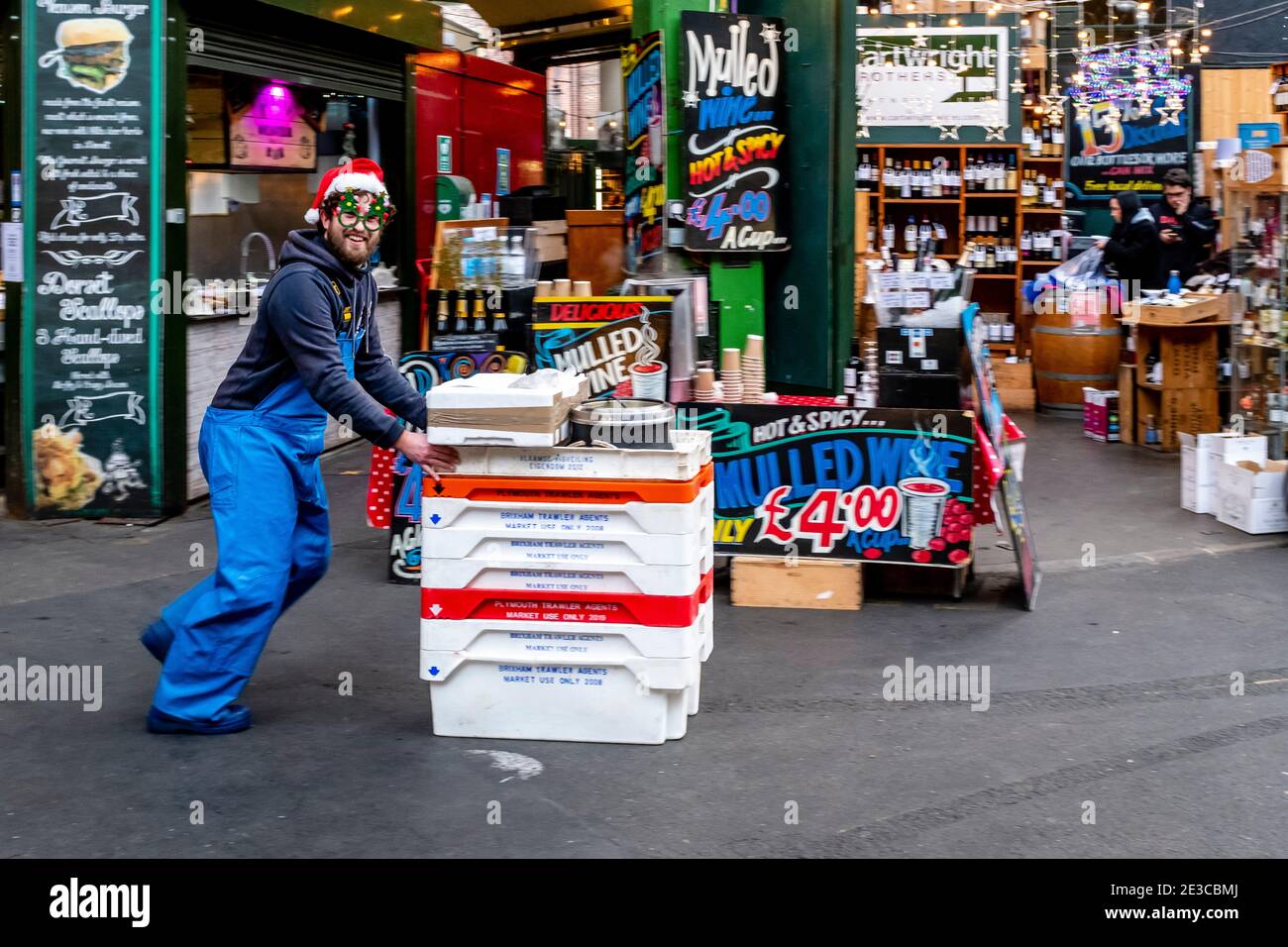 A Market Delivery Man At Christmas Time, Borough Market, London, UK. Stock Photo