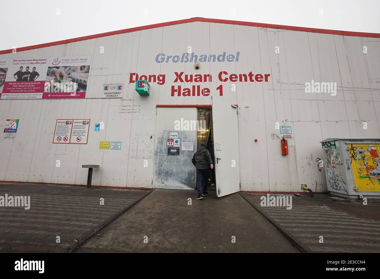 Berlin, Germany. 18th Jan, 2021. A person walks into one of the sales halls of the Dong Xuan Center. The Dong Xuan Center, which is considered Germany's largest Asian market, is said to play a role in the smuggling business. (To dpa 'BKA: Berlin 'hub' of Vietnamese human traffickers') Credit: Jörg Carstensen/dpa/Alamy Live News Stock Photo