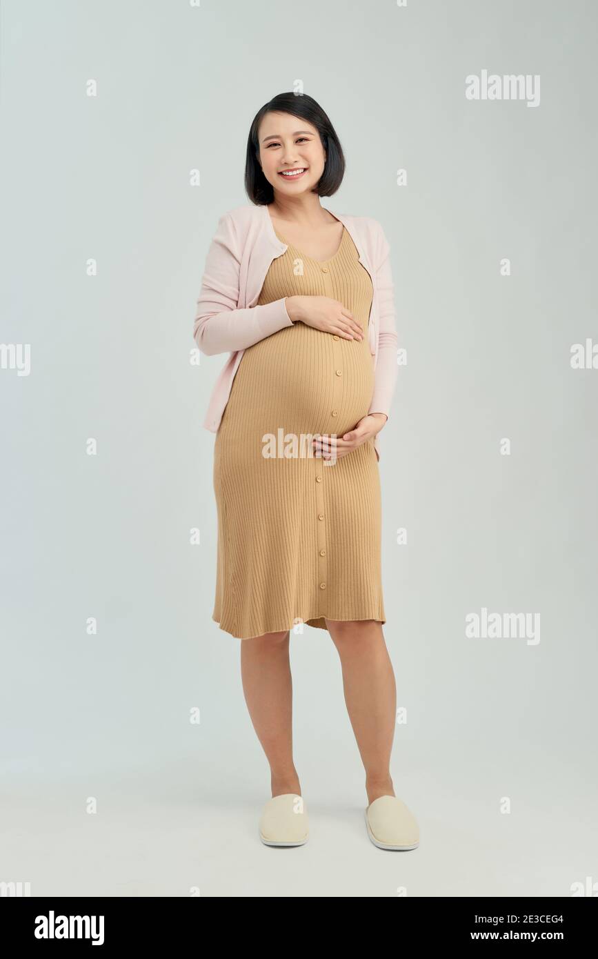 Pregnant woman wearing hi-res stock photography and images - Alamy