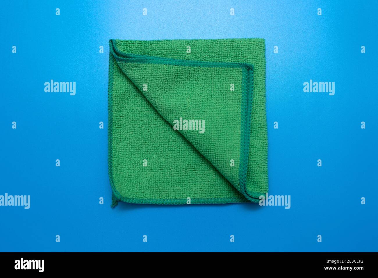 One Green microfiber cloth for different surfaces cleaning in kitchen
