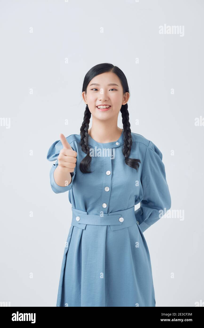 Asian woman showing thumb hi-res stock photography and images - Alamy