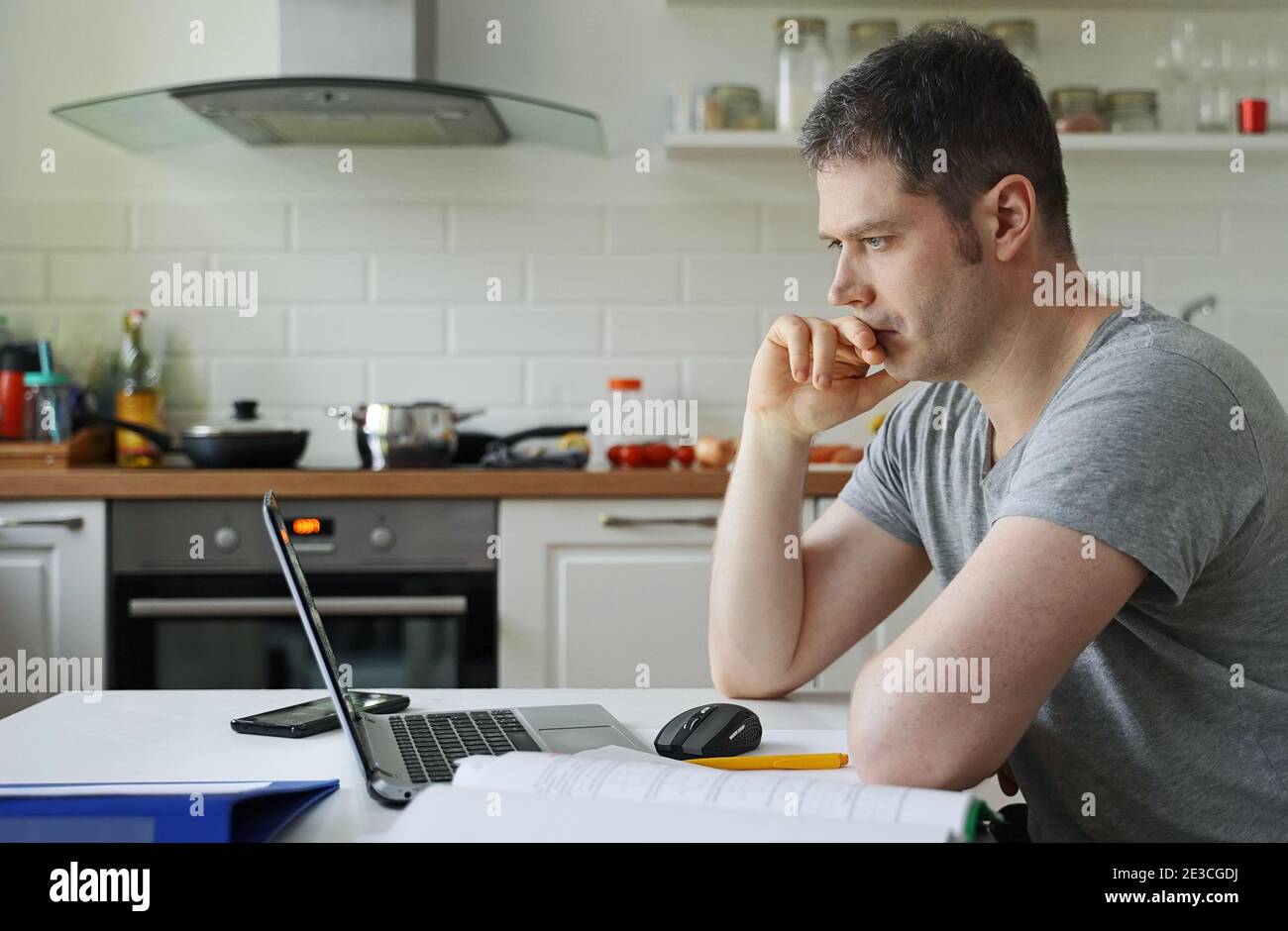 man-working-at-home-coronavirus-lockdown-2E3CGDJ.jpg