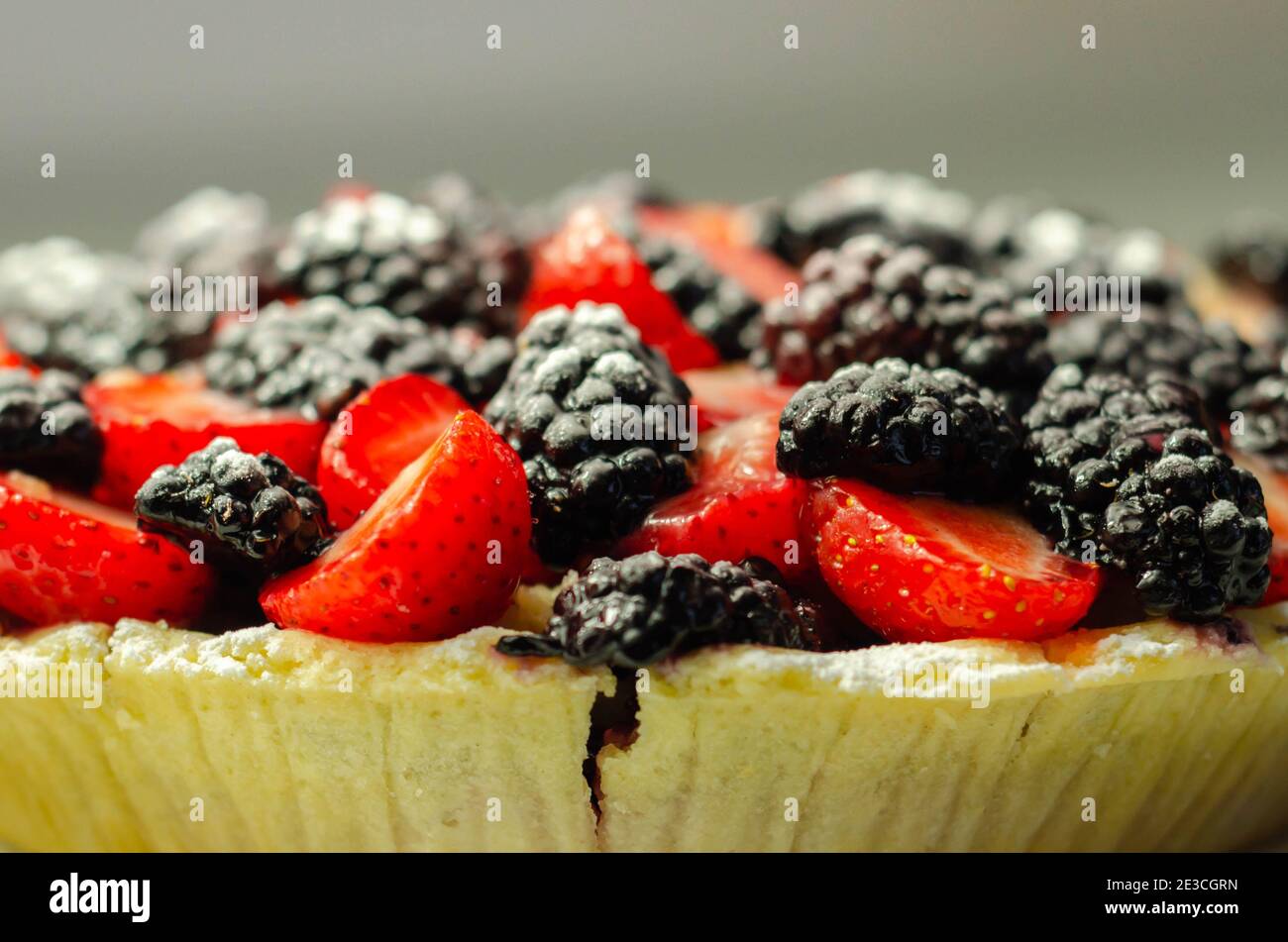 Butter enriched shortcrust pastry topped strawberries and blackberries