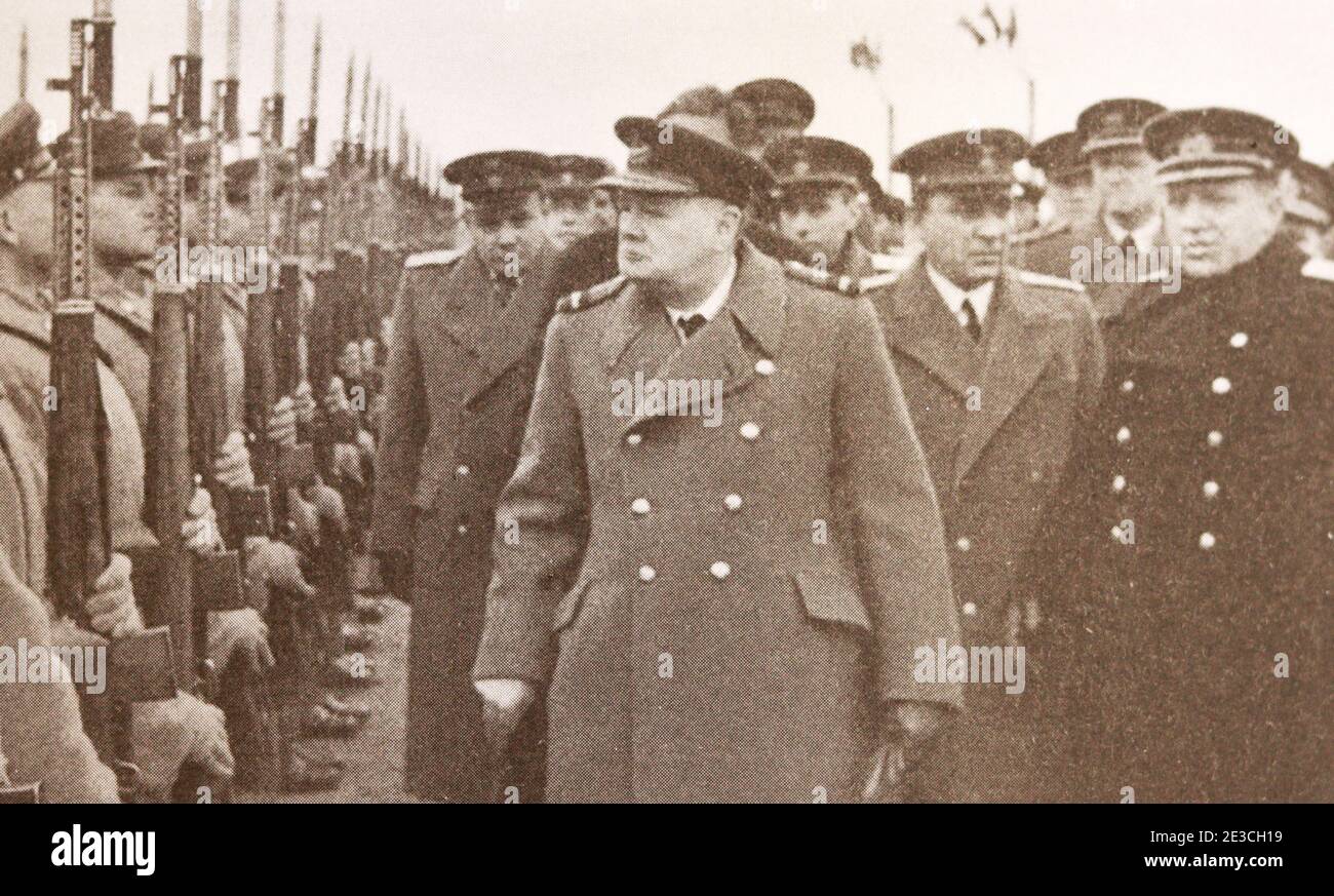 Winston Churchill bypasses the guard of honor at the military airfield in Saki in the Crimea on February 3, 1945. Stock Photo