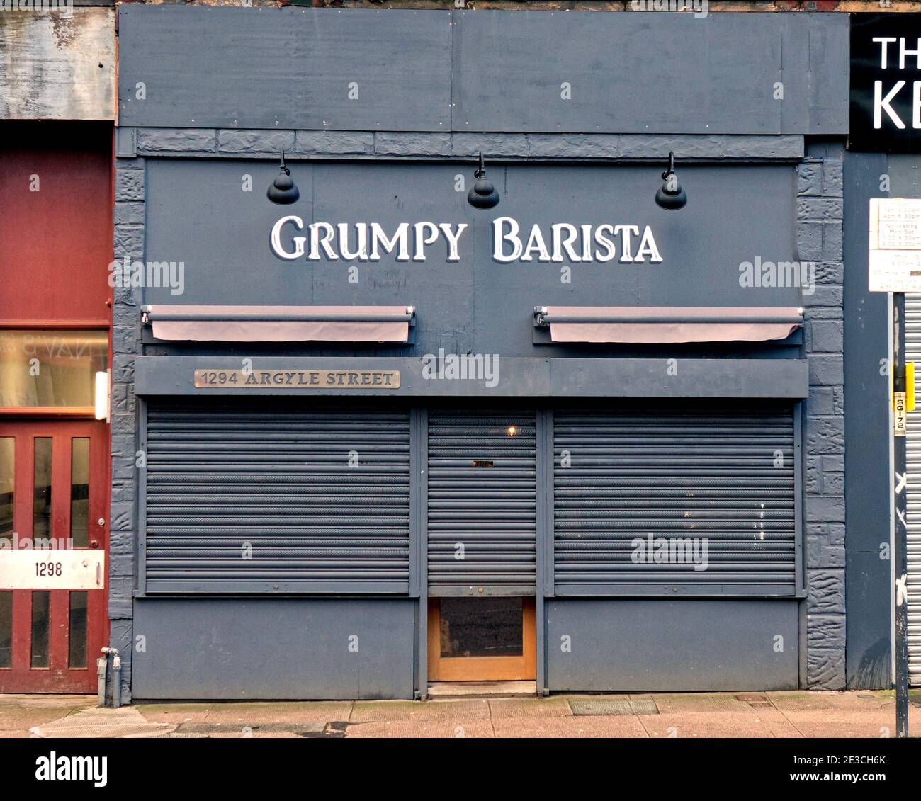 Glasgow, Scotland, UK. 18th January, 2021.Lockdown Monday saw sparsely filled streets with  people walking around lost with the new take-away rules nothing to do. This cafe in finniston was taking pre orders through the door  Credit: Gerard Ferry/Alamy Live News Stock Photo