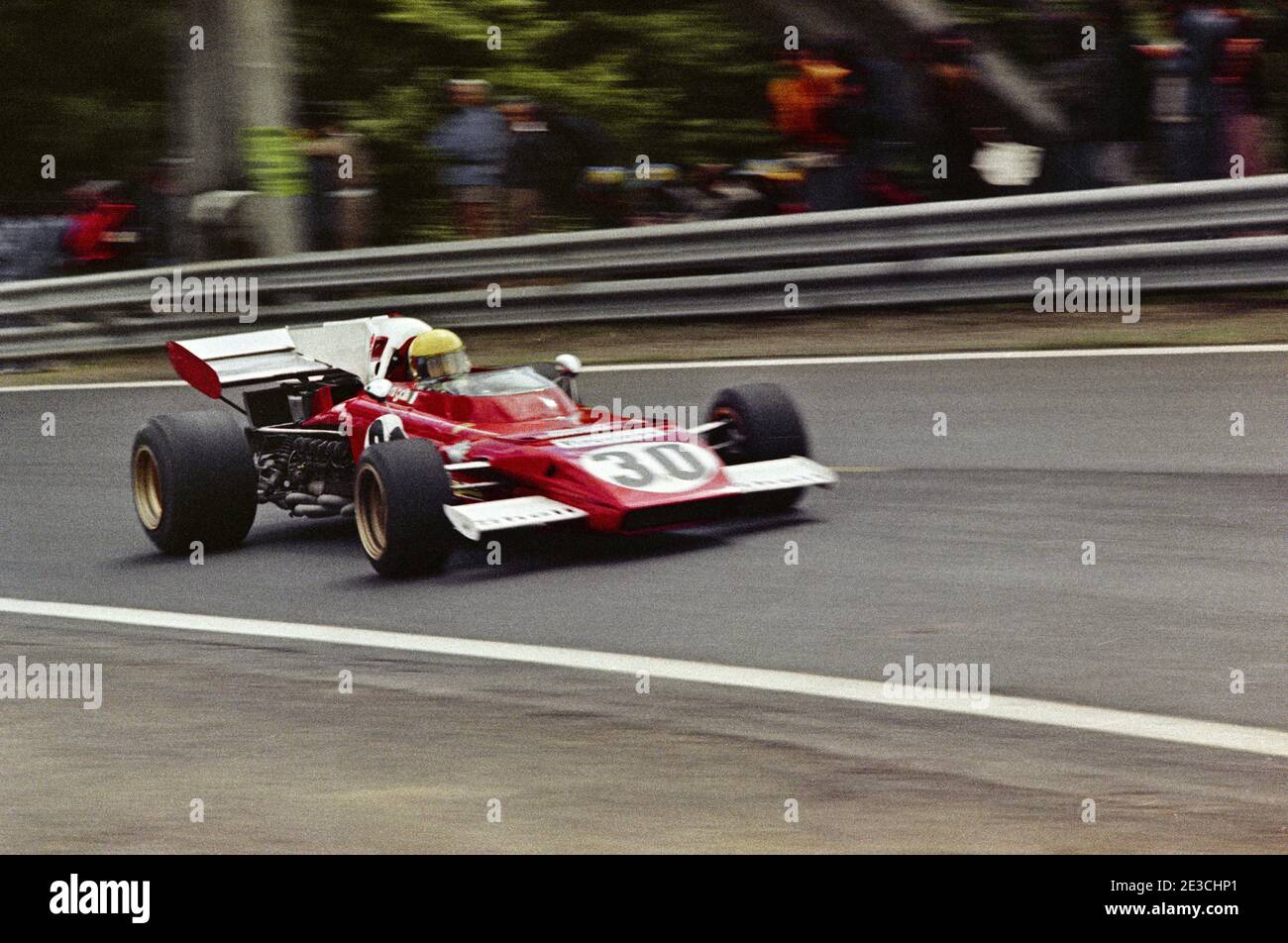 Nanni GALLI driving Ferrari F1 car in full speed during 1972 Grand Prix de France, in Charade circuit near Clermont-Ferrand. Stock Photo