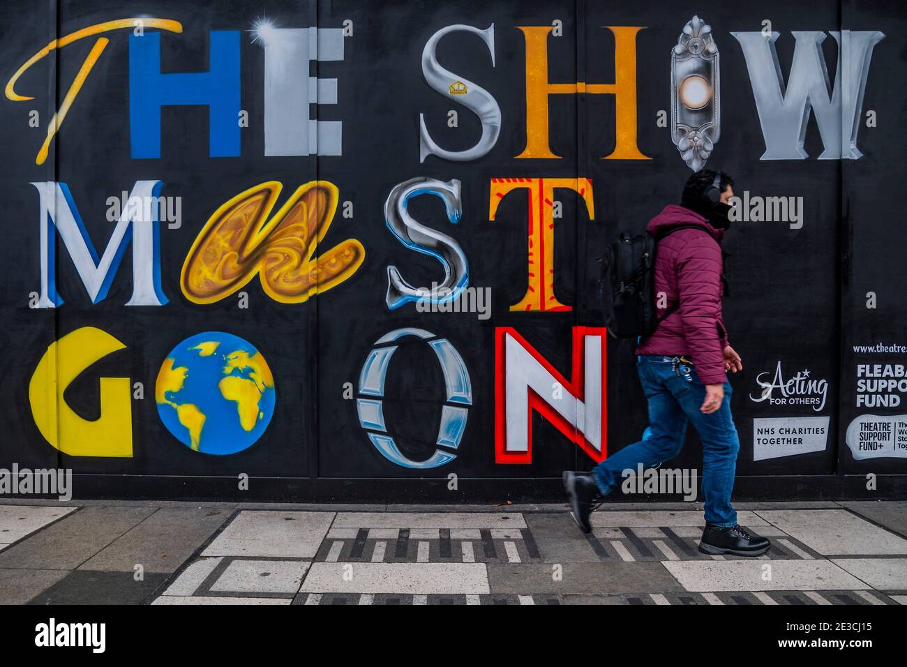London, UK. 18th Jan, 2021. The Show Must Go on sign outside the Wicked Theatre, at Victoria, during the third Coronavirus Lockdown. All the theatres remain shut with no prospect of re-opening in a financially viable way for the foreseable future. Credit: Guy Bell/Alamy Live News Stock Photo