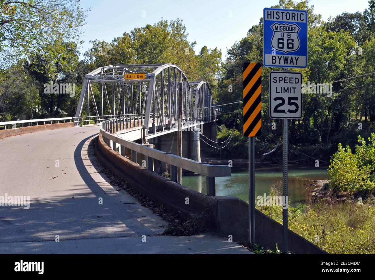 This historic bridge, built in 1923, carried the original Route 66 alignment across the Big Piney River at the village of Devils Elbow, Missouri. Stock Photo