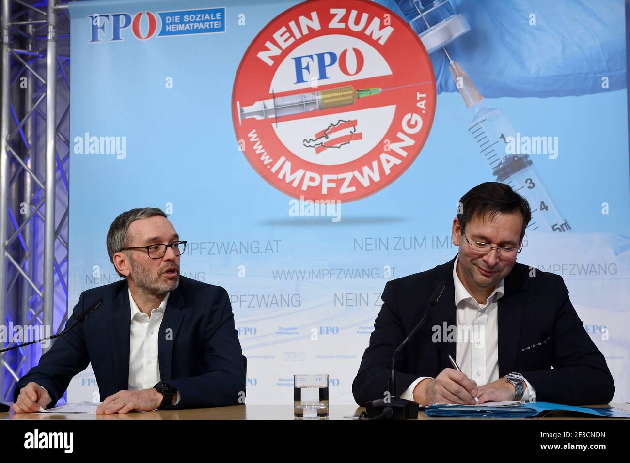 Vienna, Austria. 18th Jan, 2021. Press conference with FPÖ club chairman Herbert Kickl (L) and Education spokesman Hermann Brückl (R). The topics are the corona compulsory measures and the situation at schools. Poster with the inscription 'No to compulsory vaccination' Stock Photo